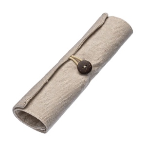 Trousse en coton à enrouler. Fermeture par bouton et élastique