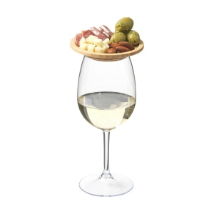 Un élégant couvercle pour verre à vin en bambou certifié FSC 100%, idéal comme petite assiette pour les entrées, les amuse-bouches ou les tapas