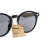 Lunettes de soleil tendances, avec une monture ronde noire matte, des branches en bambou, des verres noirs qui assurent une protection UV 400 (selon les normes européennes)
