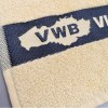 Serviette éponge avec logo tissé en liteau jacquard