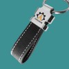 ORMO - Porte-clés Zamac avec sangle simili-cuir PU