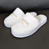 Chaussons de luxe en velours éponge avec logo brodé