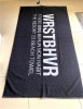 Serviette jacquard logo tissé en fils teints