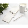 Carnet A6 dont la couverture et le papier sont fabriqués à partir de restes de papier provenant de briques de lait recyclées (jusqu'à 70%) et de 30% de papier recyclé