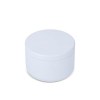 Candle in round recycled tin