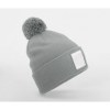 Bonnet avec pompon et patch