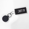 Porte-clés rond en PU souple. Avec anneau en métal