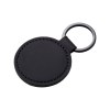 Porte-clés rond en PU souple. Avec anneau en métal